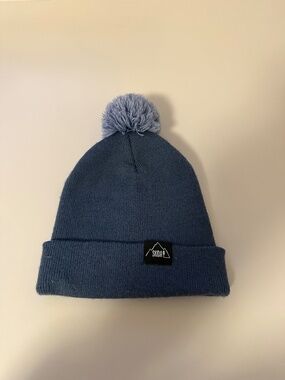 Skida Firetower Pom Beanie Hat in Blue